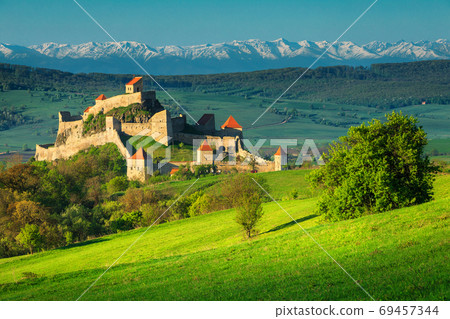 Fantastic medieval fortress in Rupea, Brasov region, Transylvania, Romania, Europe Fantastic medieval fortress in Rupea, Brasov region, Transylvania, Romania, Europe 69457344