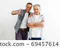 Senior Father With Adult Son isolated on white background 69457614