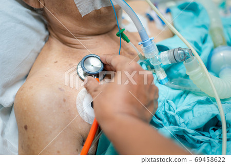 Doctor medical care patient on bed in hospital 69458622