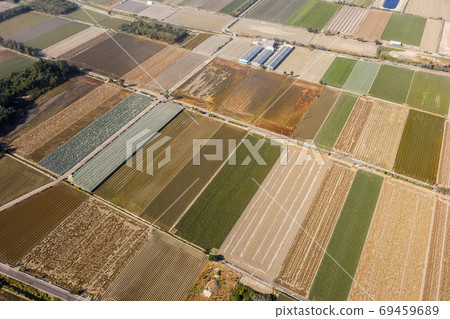 colorful farm with solar energy generation buildings 69459689