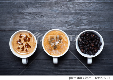 Cup of coffee, roasted beans top view with Cup of coffee, roasted beans top view with 69459727