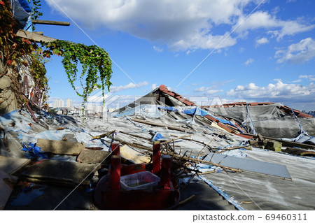 Alley. Sky. Clouds. Redevelopment Alley. Sky. Clouds. Redevelopment 69460311