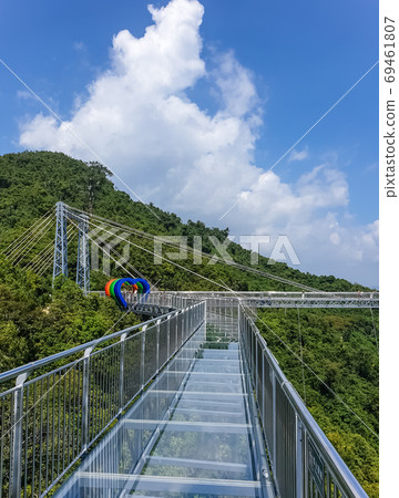 Panorama top view of glass bridge and a park in the Yanoda Rainf 69461807