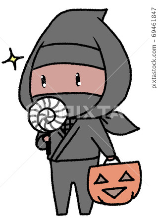 一個看起來很高興在萬聖節得到糖果的男孩 69461847