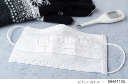 Winter infection control with mask, influenza prevention, new coronavirus control, simultaneous epidemic, health management, thermometer 69467260