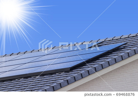 Eco-house, solar panels and blue sky_backlit version Eco-house, solar panels and blue sky_backlit version 69468876