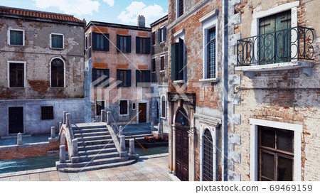 Empty city street with ancient buildings in Venice 69469159