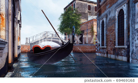 Empty venetian gondola on water canal in Venice 69469168