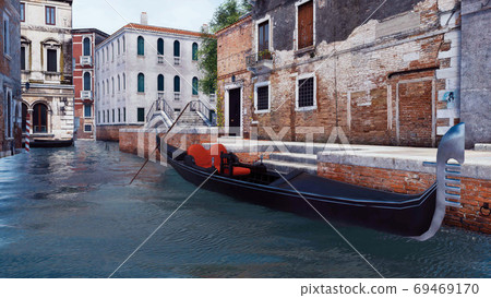 Empty gondola on a water canal in Venice, Italy 69469170