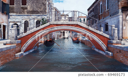 Old stone bridge over water canal in Venice, Italy 69469173