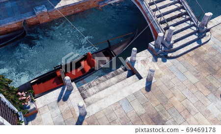 Moored empty venetian gondola on a canal Top view Moored empty venetian gondola on a canal Top view 69469178