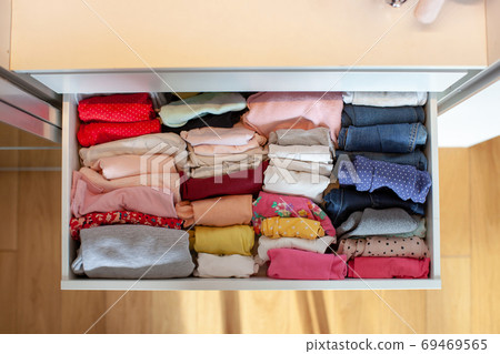 Storage in wardrobe. 69469565
