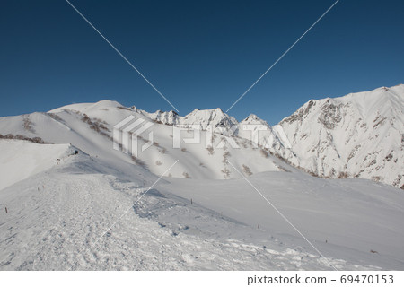 Happo Pond and Fukuki Killet seen from the Happoone route of Mt. Karamatsu in winter in Hakuba, Nagano Happo Pond and Fukuki Killet seen from the Happoone route of Mt. Karamatsu in winter in Hakuba, Nagano 69470153