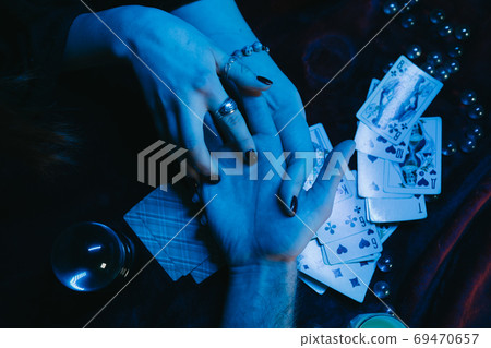 reading the lines hand in a man's hands 69470657