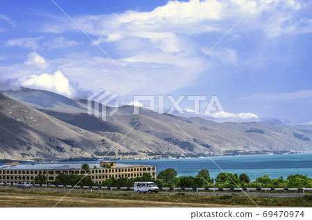 The shore of the high mountain lake Sevan is located among the mountains of the Geghama range at an altitude of 1900 meters above sea level in Armenia The shore of the high mountain lake Sevan is located among the mountains of the Geghama range at an altitude of 1900 meters above sea level in Armenia 69470974