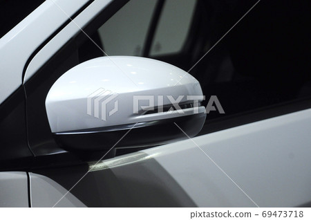 KUALA LUMPUR, MALAYSIA -NOVEMBER 12, 2017: Car side mirror or door mirror build at extrior of car for the purposes of helping the driver see areas behind and to the sides of the vehicle.   69473718