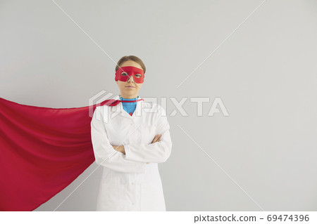 Confident superhero doctor with crossed arms Confident superhero doctor with crossed arms 69474396