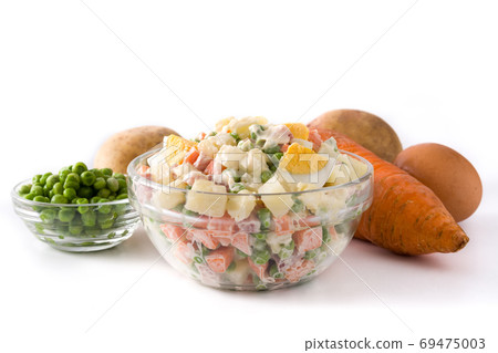 Traditional Russian salad in bowl. Olivier salad isolated on white background Traditional Russian salad in bowl. Olivier salad isolated on white background 69475003