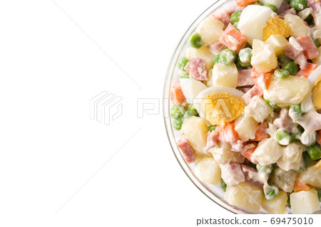 Traditional Russian salad in bowl. Olivier salad isolated on white background with copy space Traditional Russian salad in bowl. Olivier salad isolated on white background with copy space 69475010