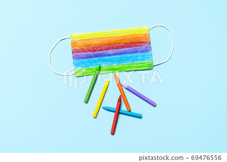 Colorful medical mask top view. Rainbow face mask and multicolor 69476556
