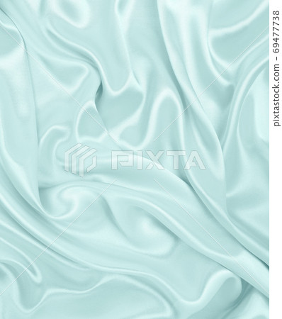 Smooth elegant blue silk or satin luxury cloth texture as abstra Smooth elegant blue silk or satin luxury cloth texture as abstra 69477738