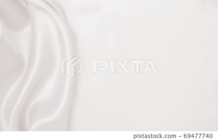 Smooth elegant golden silk or satin luxury cloth texture as wedd 69477740