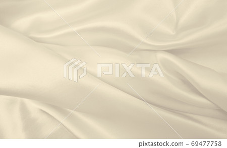 Smooth elegant golden silk or satin luxury cloth texture as wedd Smooth elegant golden silk or satin luxury cloth texture as wedd 69477758