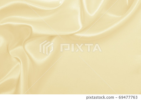 Smooth elegant golden silk or satin luxury cloth texture as wedd Smooth elegant golden silk or satin luxury cloth texture as wedd 69477763