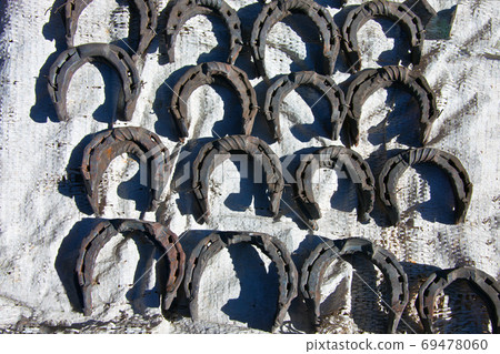 New forged horseshoes on the counter of the cattle market 69478060