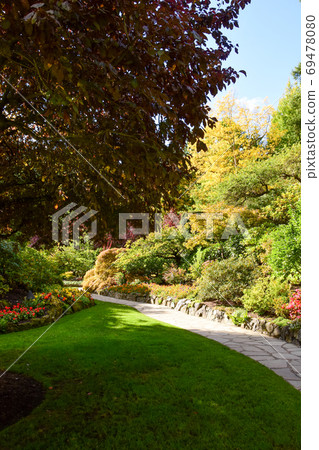 Beautiful garden and alley with flowers Victoria British Columbia Canada Beautiful garden and alley with flowers Victoria British Columbia Canada 69478080