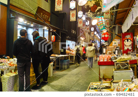 A view of the stores in Nishiki Market in the center of Kyoto, a tourist destination in Kyoto 69482481