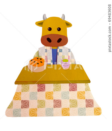 A cow paper craft that sits on a kotatsu wearing a hanten 69483608