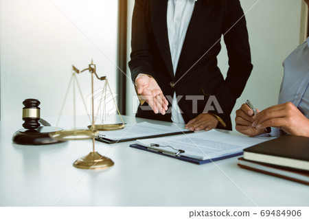 Legal advisor is explaining the offense under the law in the boo 69484906