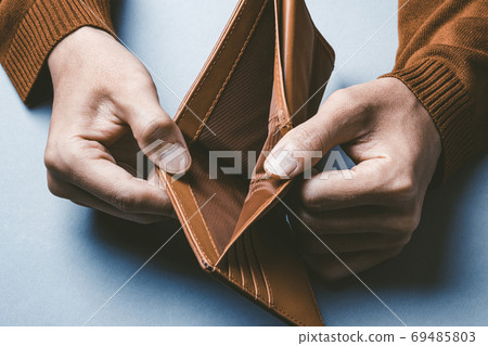Men showing in wallet Men showing in wallet 69485803
