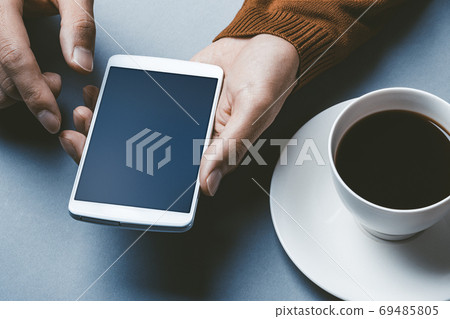 A man with a smartphone A man with a smartphone 69485805