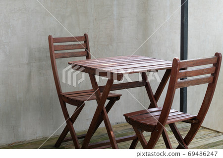 Old wood chair in coffee cafe shop. Old wood chair in coffee cafe shop. 69486247
