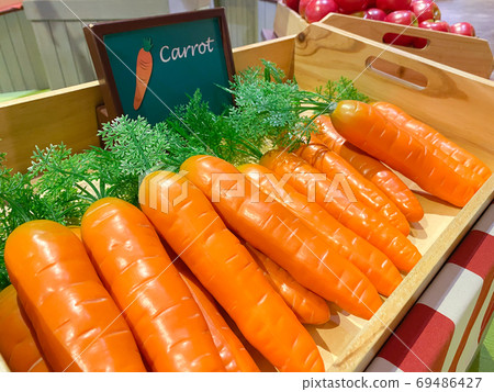 Artificial orange carrot. 69486427