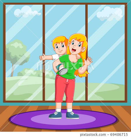 The boy is playing with his mother 69486715