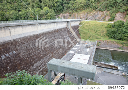 View of the dam in the river Our near Vianden, Luxembourg View of the dam in the river Our near Vianden, Luxembourg 69488072