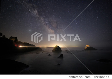 The Milky Way Over a Rocky Beach The Milky Way Over a Rocky Beach 69488333