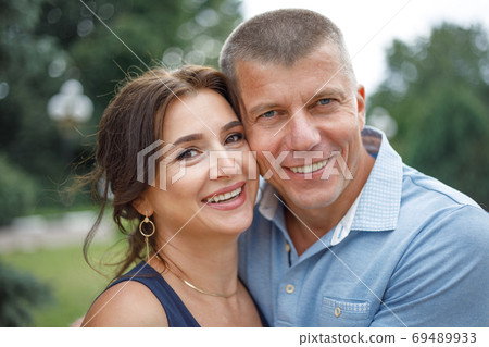 Happy mature couple enjoying life together Happy mature couple enjoying life together 69489933