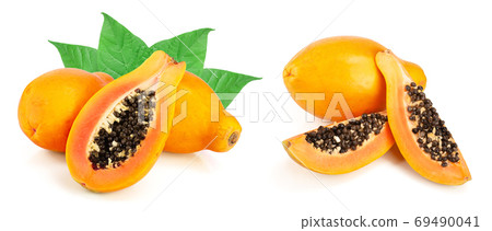 ripe cut papaya with leaves isolated on a white background 69490041