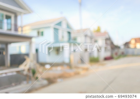 Housing subdivision blur background. Housing subdivision blur background. 69493074