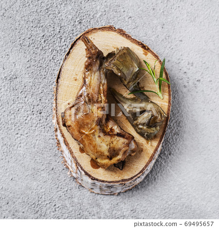 cooked rabbit, typically eaten in Spain 69495657