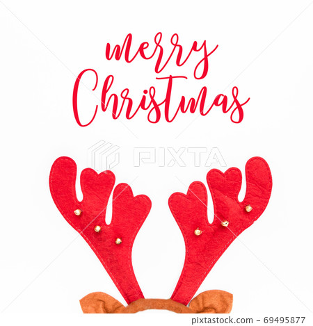 Christmas deer hat. Flat lay, top view Christmas concept. 69495877