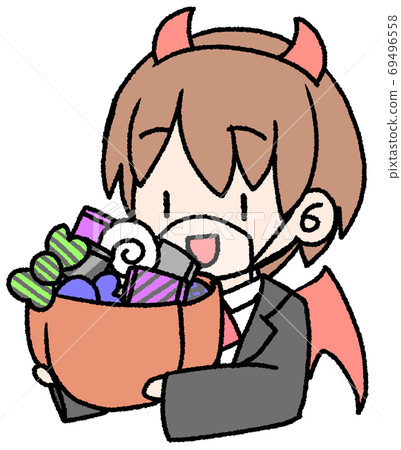 A boy who got a lot of sweets at Halloween with a mouse shield 69496558