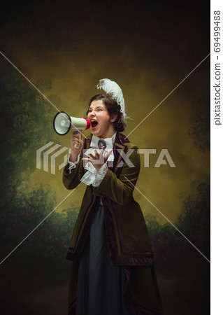 Modern trendy look, portrait of renaissance period beautiful woman. Retro style, comparison of eras concept. 69499488