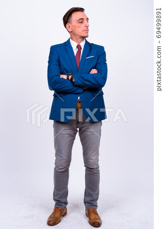 Mature handsome Italian businessman against white background Mature handsome Italian businessman against white background 69499891