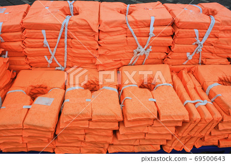 life jacket's sorted on the ship with water drops 69500643