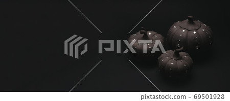 Ceramic pumpkins with rhinestones on a black background. Ceramic pumpkins with rhinestones on a black background. 69501928